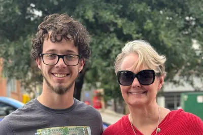 Koby and Gail in Austin after the Robotaxi ride