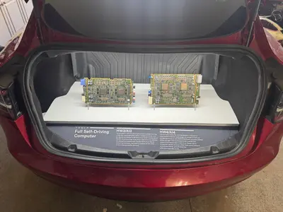 The finished FSD hardware display installed in the trunk at Chattanooga Charge