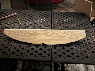 The slanted wood piece freshly cut from 3/4-inch board