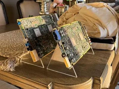 Both acrylic stands assembled and holding the FSD hardware
